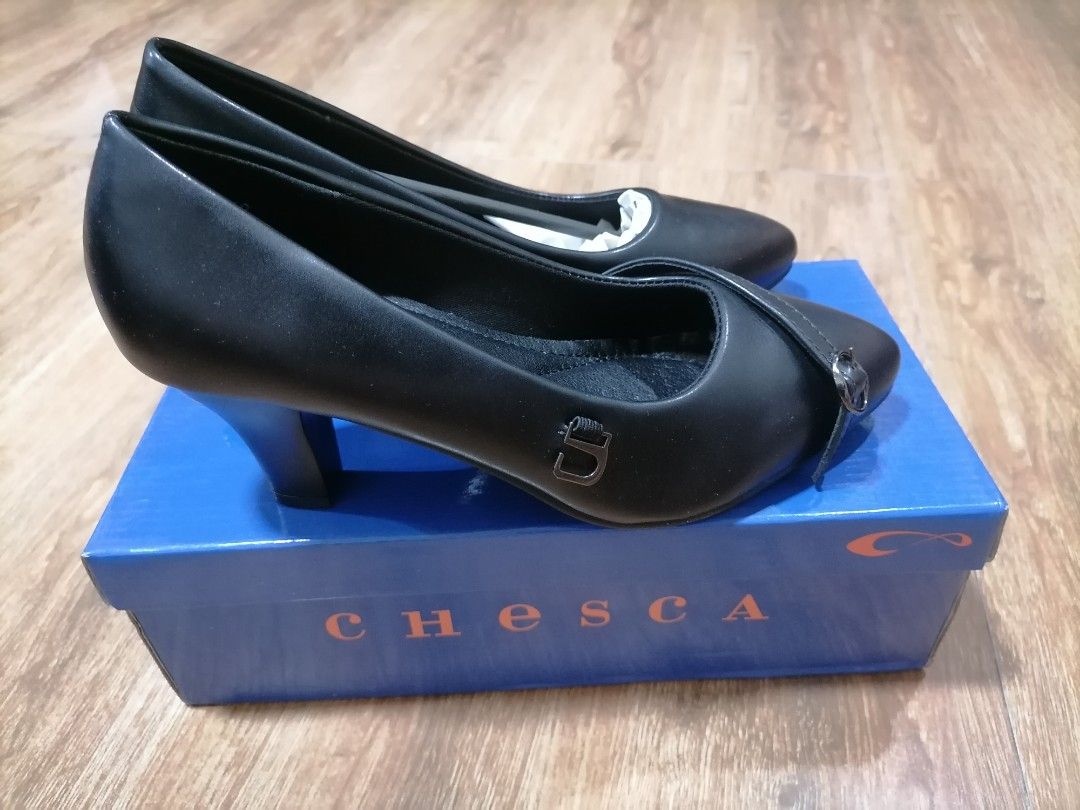 CHESCA Black Heels with Buckle Detail (Category: Heels) located in Caloocan City. Submitted by weiner_ (Listing ID 1449406892, Image 1). Description: - Brand: Chesca - Color: Black - Style: Classic pump - Features: Pointed toe, strap with buckle detail - Condition: not used, comes with original box - Size 36.