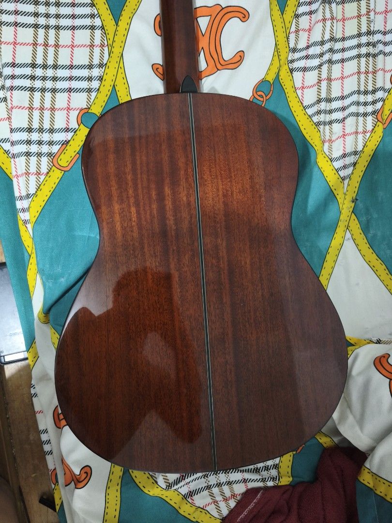 Classical Guitar Severo CG-1T (Category: Musical Instruments) located in Los Banos. Submitted by jensenroiperez (Listing ID 1449482948, Image 2). Description: - Negotiable - Severo CG-1T Classical Guitar - Gloss Finish 41" - Gold Plated Tuners - With bag - With truss rod - Need pa ipasetup siguro konti para mag improve playing kase never pa napasetup since binili - Orig price is 7,800 - Equipped with D'addario Strings.