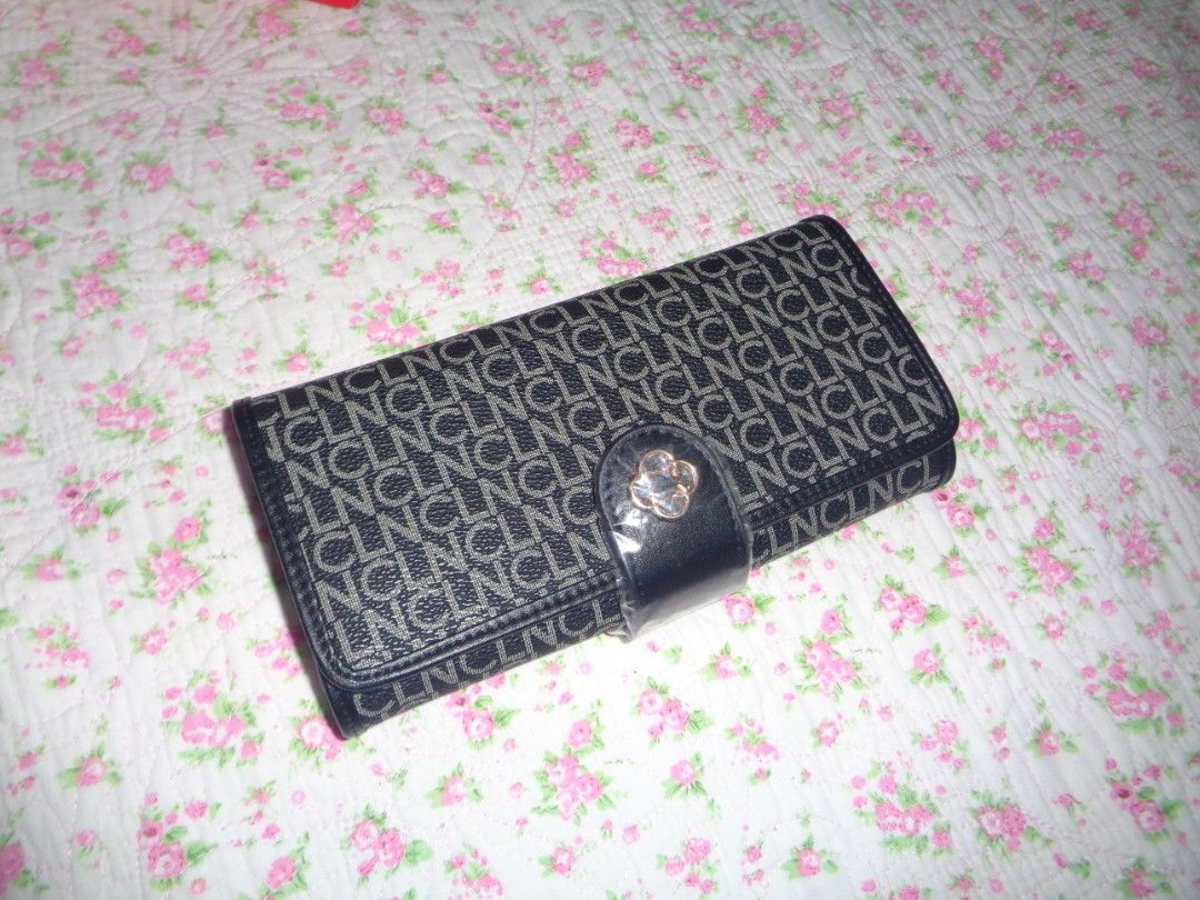 CLN Analey Monogram Long Wallet (Category: Luxury Bags & Wallets) located in Batangas. Submitted by gelidium_lloyd (Listing ID 1449507672, Image 2). Description: - Authentic CLN long wallet - Features all-over CLN monogram pattern - Comes with original red CLN box - Includes CLN dust bag - Also includes CLN red paper bag - Ideal for gifting or personal organization.