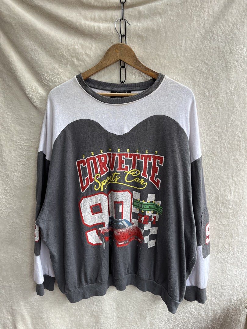 Colorblock Chevrolet Corvette Graphic Pullover Sweatshirt. | Size L (Category: Hoodies) located in General Trias. Submitted by zrchustle.604 (Listing ID 1449529731, Image 2). Description: Forever 21 Colorblock Chevrolet Corvette Graphic Pullover Sweatshirt. Key Features Design: Features an oversized, colorblock layout with grey, white, and dark charcoal panels. Graphics: Features classic racing details including a red Corvette car illustration, a