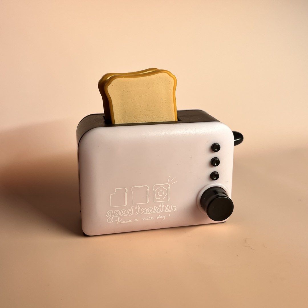 Cute Mini Bread Toaster Trinket, Anik-Anik (Category: Ovens & Toasters) located in Manila. Submitted by prlvdtmsss (Listing ID 1449507070, Image 2). Description: Cute pink toaster trinket 🍞 - Has two bread slices - You can pull down the lever and push the button to make the toasts pop up like in real life! Super cuteee. And the color is nice Dm for more info!.