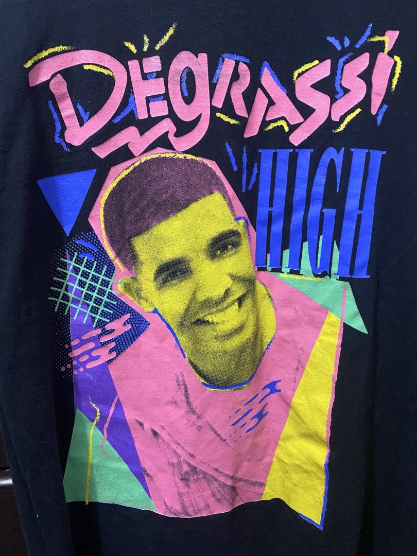 Degrassi High Drake T-shirt (Category: Tshirts & Polo Shirts ) located in Cavite. Submitted by grabanddeclutter (Listing ID 1449333348, Image 2). Description: - In great condition, check issues last 3 pictures - Black t-shirt with Drake 'Degrassi High' graphic print - Retro, colorful design - Dimensions: Width 21 Length 28 No COD gcash payment Plus shipping fee Jnt or lalamove.