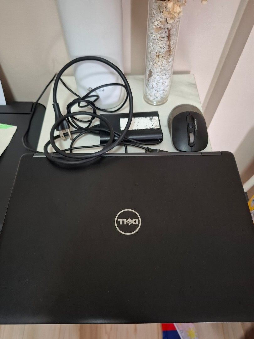 Dell Laptop with Mouse and Charger (Category: Laptops & Notebooks) located in Calamba. Submitted by iammommygeline (Listing ID 1449391973, Image 1). Description: - Dell laptop powers on to Dell logo screen - Includes wireless mouse - Original charger included - Ideal for work or school tasks - Ready for its new owner - core i5 7th gen **negotiable.