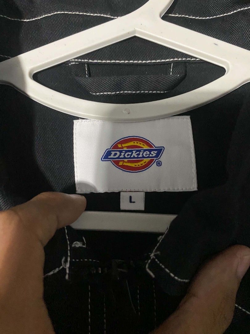 Dickies Black Work Jacket with White Stitching - Size L (Category: Coats, Jackets and Outerwear) located in Manila. Submitted by justinthriftshop_07 (Listing ID 1449494009, Image 3). Description: - Classic black Dickies work jacket - Features contrast white stitching - Two chest pockets and two lower flap pockets - Full zip front closure - Made from a comfortable cotton blend - Ideal for everyday wear or work.
