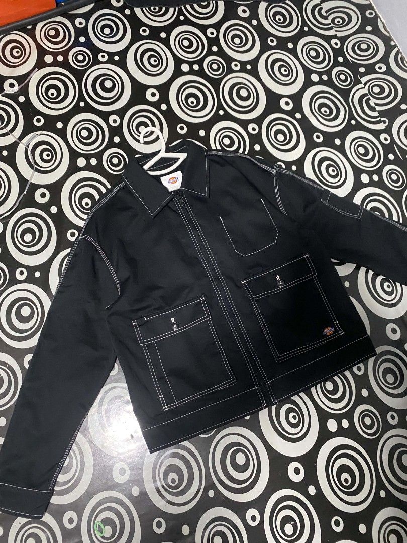 Dickies Black Work Jacket with White Stitching - Size L (Category: Coats, Jackets and Outerwear) located in Manila. Submitted by justinthriftshop_07 (Listing ID 1449494009, Image 1). Description: - Classic black Dickies work jacket - Features contrast white stitching - Two chest pockets and two lower flap pockets - Full zip front closure - Made from a comfortable cotton blend - Ideal for everyday wear or work.