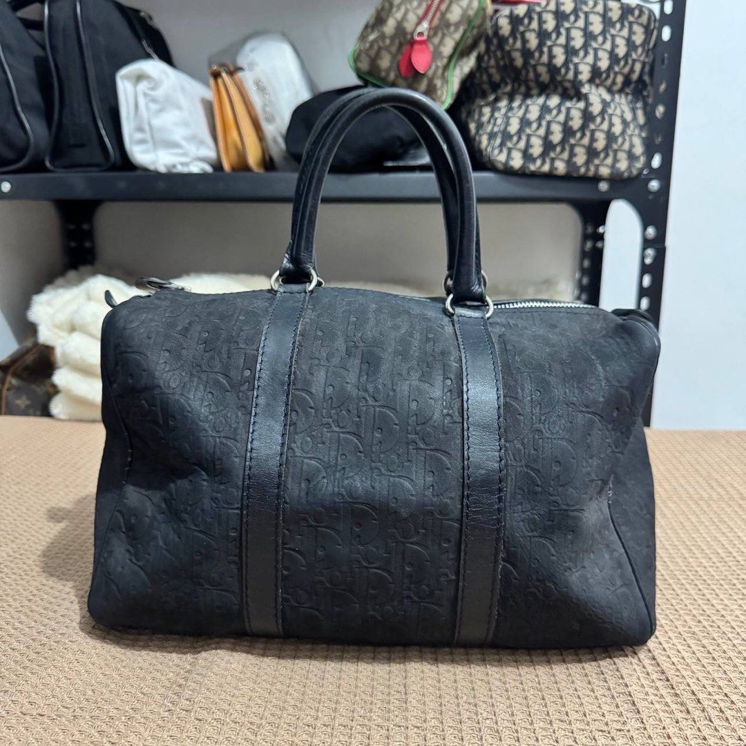 Dior Blue Oblique Leather Duffle Bag - Medium (Category: Luxury Bags & Wallets) located in Angeles City. Submitted by cherrypicked.ph (Listing ID 1449483840, Image 1). Description: Dior Blue Oblique Leather Duffle Bag - Medium Condition & Flaws: (See Detailed Pictures Attached) Made in France 📐 Measurements in CM Height: 19 cm Width: 30 cm Depth: 16 cm Drop: 13 cm 📎 TAKE NOTE : • Please note that this is a used / thrifted piece, and minor imper