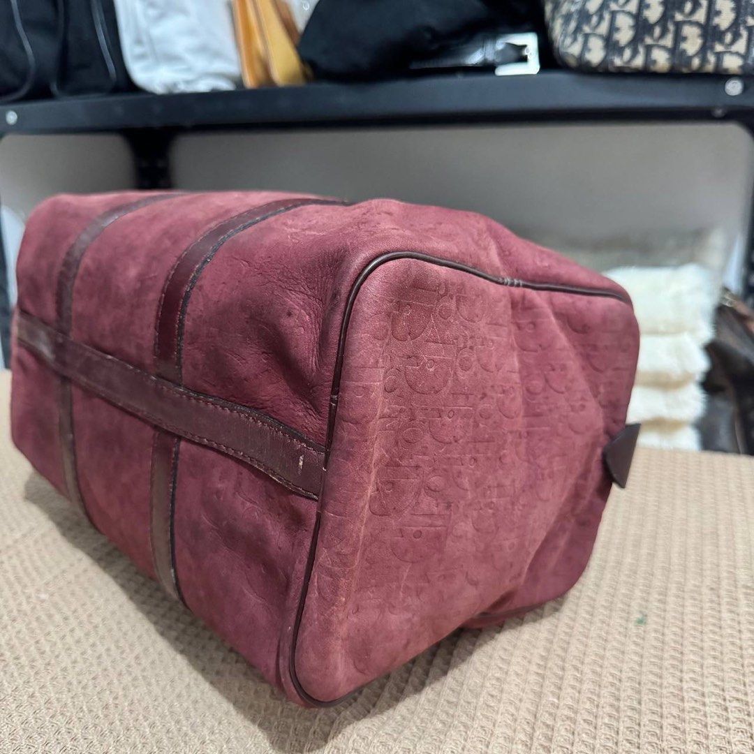 Dior Red Oblique Canvas Duffle Bag - Medium (Category: Luxury Bags & Wallets) located in Angeles City. Submitted by cherrypicked.ph (Listing ID 1449445589, Image 3). Description: Dior Red Oblique Canvas Duffle Bag - Medium Condition & Flaws: (See Detailed Pictures Attached) Made in France 📐 Measurements in CM Height: 20 cm Width: 30 cm Depth: 16 cm Drop: 12 cm 📎 TAKE NOTE : • Please note that this is a used / thrifted piece, and minor imperfect
