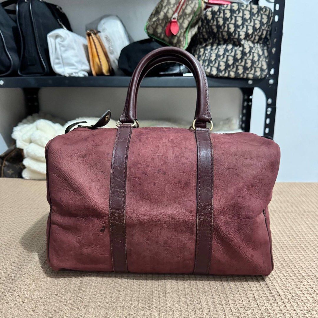 Dior Red Oblique Canvas Duffle Bag - Medium (Category: Luxury Bags & Wallets) located in Angeles City. Submitted by cherrypicked.ph (Listing ID 1449445589, Image 1). Description: Dior Red Oblique Canvas Duffle Bag - Medium Condition & Flaws: (See Detailed Pictures Attached) Made in France 📐 Measurements in CM Height: 20 cm Width: 30 cm Depth: 16 cm Drop: 12 cm 📎 TAKE NOTE : • Please note that this is a used / thrifted piece, and minor imperfect