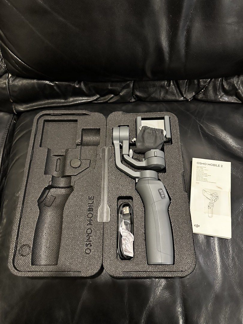 DJI Osmo Mobile 2 (Category: Gimbals & Stabilizers ) located in Makati City. Submitted by al_ways.ph (Listing ID 1449434196, Image 2). Description: Selling DJI Osmo Mobile 2 for 2k pesos KEY FEATURES: 3 AXIS STABILIZATION PORTRAIT AND LANDSCAPE MODE ACTIVE TRACK 15 HOUR BATTERY LIFE Complete box and wires Loc: Makati City Mop: Gcash/bdo/maribank/gotyme Shipping must be shouldered by the buyer .