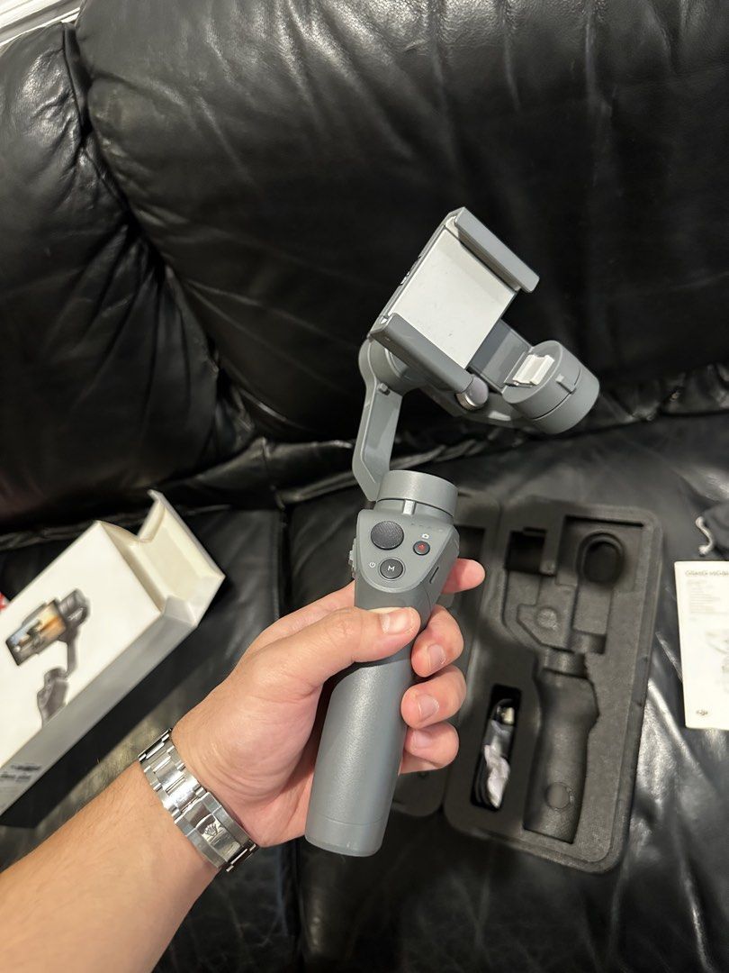 DJI Osmo Mobile 2 (Category: Gimbals & Stabilizers ) located in Makati City. Submitted by al_ways.ph (Listing ID 1449434196, Image 3). Description: Selling DJI Osmo Mobile 2 for 2k pesos KEY FEATURES: 3 AXIS STABILIZATION PORTRAIT AND LANDSCAPE MODE ACTIVE TRACK 15 HOUR BATTERY LIFE Complete box and wires Loc: Makati City Mop: Gcash/bdo/maribank/gotyme Shipping must be shouldered by the buyer .