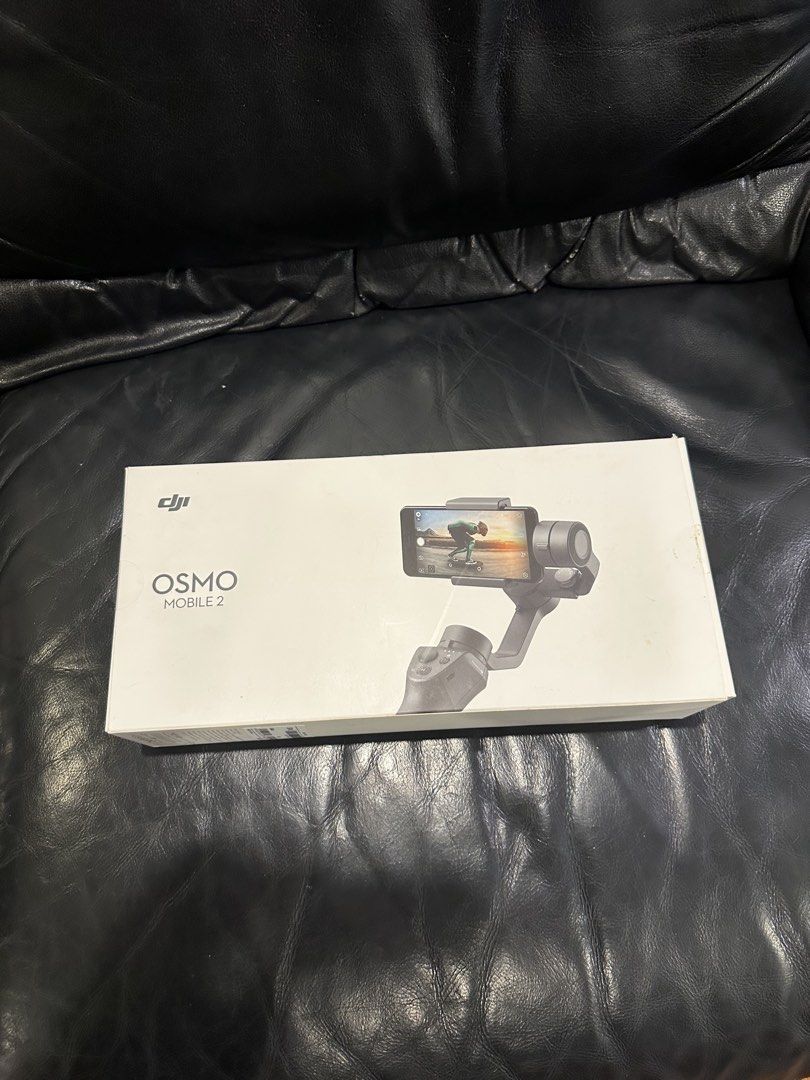 DJI Osmo Mobile 2 (Category: Gimbals & Stabilizers ) located in Makati City. Submitted by al_ways.ph (Listing ID 1449434196, Image 1). Description: Selling DJI Osmo Mobile 2 for 2k pesos KEY FEATURES: 3 AXIS STABILIZATION PORTRAIT AND LANDSCAPE MODE ACTIVE TRACK 15 HOUR BATTERY LIFE Complete box and wires Loc: Makati City Mop: Gcash/bdo/maribank/gotyme Shipping must be shouldered by the buyer .