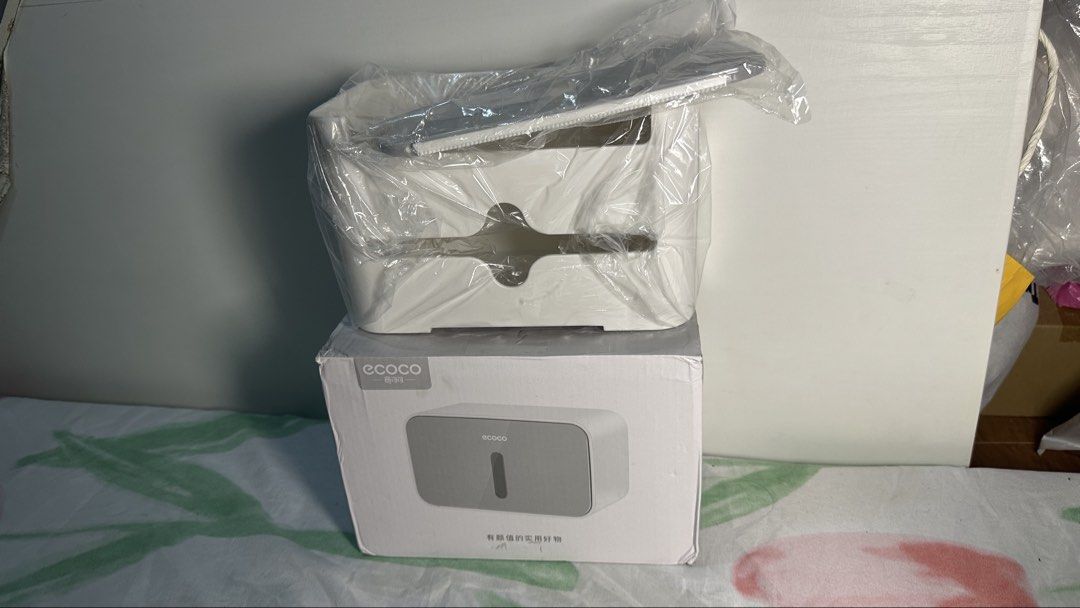 ECOCO Wall Mounted Tissue Box Holder Dispenser White (Category: Storage Boxes & Baskets) located in Naic. Submitted by cilissa (Listing ID 1449432274, Image 2). Description: - Stylish white and grey wall-mounted tissue box holder. - Brand new, in original packaging. - Simple and easy installation. - Keeps tissues neat and readily accessible. - Perfect for bathrooms and kitchens..