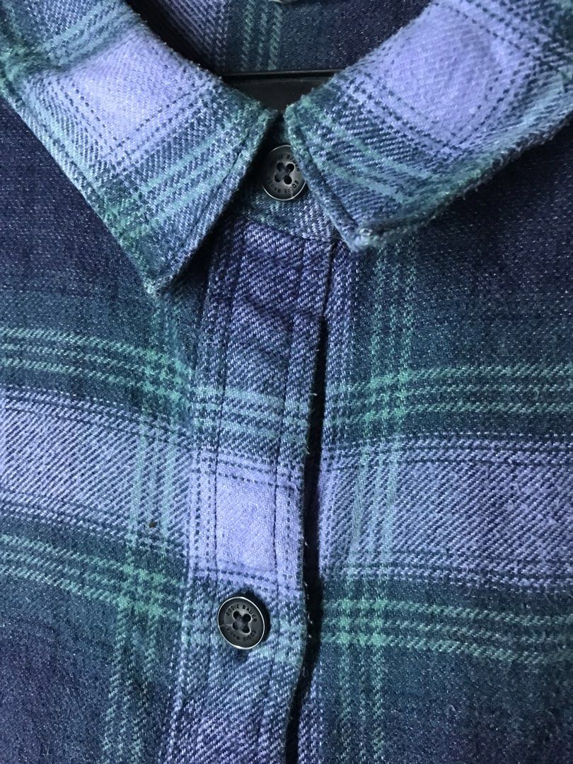 Eddie Bauer Flannel Size XL (Category: Tshirts & Polo Shirts ) located in Mabalacat. Submitted by jayty_ (Listing ID 1449446900, Image 3). Description: - Eddie Bauer Flannel Shirt - Size: XL - Color: Classic Purple & Green Plaid - Style: Long sleeves with button cuffs - Features: One chest pocket - Material: Comfortable and warm, perfect for layering or standalone wear.