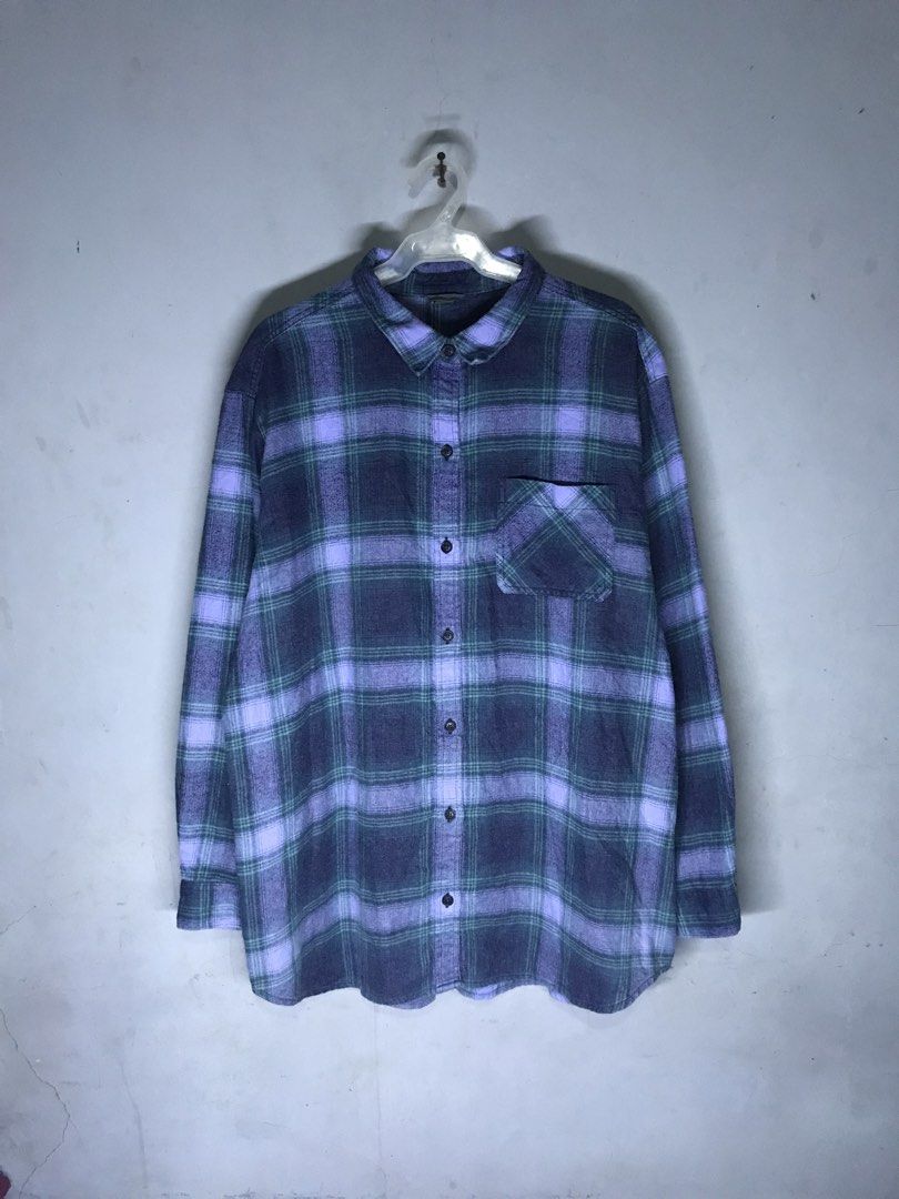 Eddie Bauer Flannel Size XL (Category: Tshirts & Polo Shirts ) located in Mabalacat. Submitted by jayty_ (Listing ID 1449446900, Image 1). Description: - Eddie Bauer Flannel Shirt - Size: XL - Color: Classic Purple & Green Plaid - Style: Long sleeves with button cuffs - Features: One chest pocket - Material: Comfortable and warm, perfect for layering or standalone wear.
