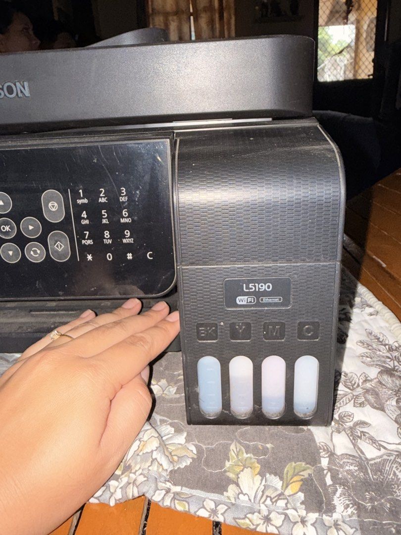 Epson L5190 EcoTank Printer WiFi Ethernet (Category: Printers, Scanners & Copiers) located in Muntinlupa City. Submitted by akosiaii (Listing ID 1449336385, Image 2). Description: - Epson L5190 Printer - WiFi and Ethernet Connectivity - Visible Ink Tanks on the Side - Control Panel with Screen and Buttons - Top Scanner Lid Need na po palitan ang head and nagbara na yung sa ink kasi di na nagagamit. Kayo na po bahala magpaayos. As is.