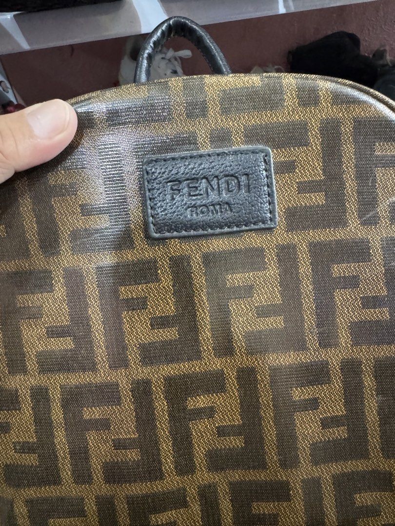 Fendi Roma FF Monogram Backpack (Category: Luxury Bags & Wallets) located in Manila. Submitted by wildbear.e10374 (Listing ID 1449344488, Image 2). Description: Classic Fendi backpack with the iconic FF monogram. Brown and black colorway. Has a front zipper pocket and main compartment. Interior has a zippered pocket and a sleeve pocket. Straps are adjustable. Great for everyday use..
