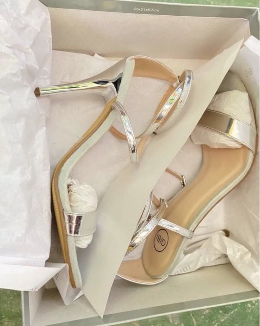 GIBI Silver Strappy Stiletto Heels Sandals (Category: Heels) located in Rizal. Submitted by melowfashion_preloved (Listing ID 1449502280, Image 3). Description: PLEASE READ 👇 ❌No to BOGUS buyer ✅ Item is AVAILABLE 📍Rizal, shipping via Lalamove or Grab - Brand: GIBI - Color: Silver -Size: 23cm, US 6 - Style: Strappy heels - Features: Delicate ankle strap, pointed toe, sleek stiletto heel - Condition: Comes with original box and tissue paper - Ap