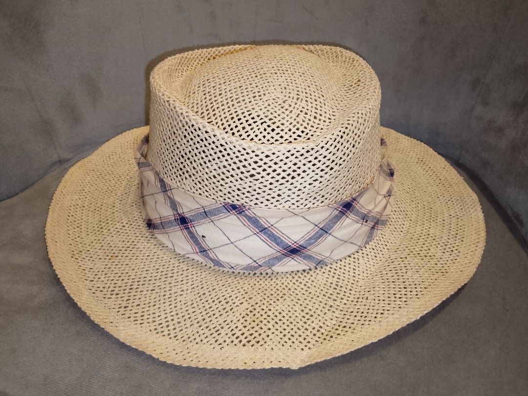 Golf Trends Straw Hat with Plaid Band (Category: Hats & Beanies) located in Binangonan. Submitted by yuristalin888 (Listing ID 1449353468, Image 1). Description: - Lightweight straw hat for sunny days - Breathable weave for comfort - Stylish plaid band accent - Provides excellent sun protection - Comfortable to wear - Made in the USA.