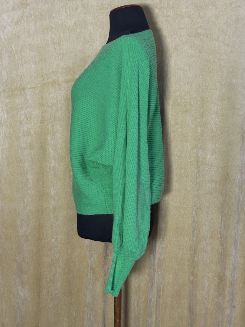 Green Batwing Sleeve Ribbed Knit Sweater (Category: Longsleeves) located in Batangas. Submitted by mkjgb (Listing ID 1449409142, Image 2). Description: Length from shoulder is 16”. Width at waist is 19” (laud flat). Never been worn. - Bright green sweater - Boat neckline - Ribbed knit texture all over - Batwing sleeves (wide middle, cinched wrist) - Super comfy and stylish - Great for layering or wearing alone ❄️ Travel-Ready Winter Wear | Stylis