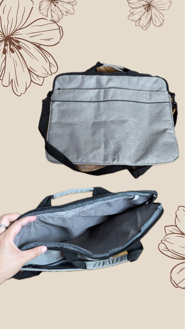 Grey Laptop Bag with Shoulder Strap (Category: Laptop Bags & Sleeves) located in Calamba. Submitted by gie_24 (Listing ID 1449434527, Image 1). Description: - Grey laptop bag - Main compartment with zipper closure - Front pocket for extra storage - Detachable shoulder strap - Ideal for carrying your laptop and essentials - Simple and functional design.