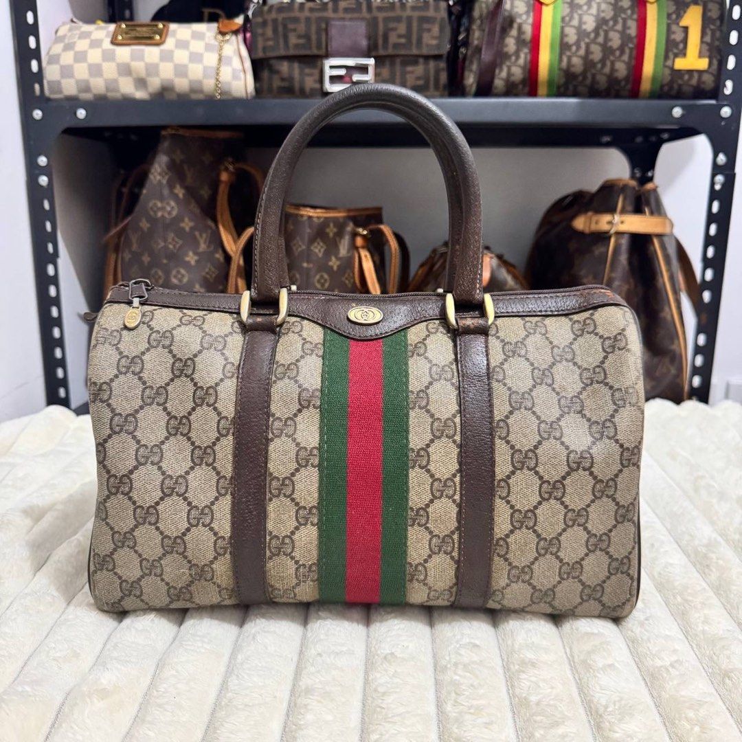 Gucci Cherry Line Boston Bag (Category: Luxury Bags & Wallets) located in Angeles City. Submitted by cherrypicked.ph (Listing ID 1449486617, Image 1). Description: Gucci Cherry Line Boston Bag Condition & Flaws: (See Detailed Pictures Attached) Made in Italy 📐 Measurements in CM Height: 18 cm Width: 32 cm Depth: 18 cm Drop: 13 cm Code: 012•3842•58 📎 TAKE NOTE : • Please note that this is a used / thrifted piece, and minor imperfections are part