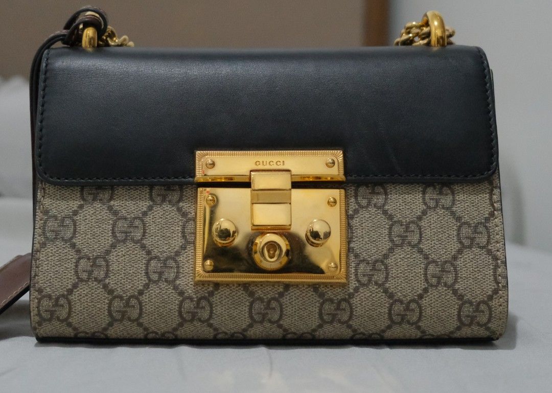 Gucci Padlock GG Supreme Canvas Shoulder Bag (Category: Luxury Bags & Wallets) located in Caloocan City. Submitted by rmdesilva (Listing ID 1442748662, Image 1). Description: - Authentic Gucci GG Supreme canvas bag - Black leather accents - Gold-tone hardware - Detachable chain strap - Secure lock closure - Interior main compartment and small pocket - Versatile for day or night use.