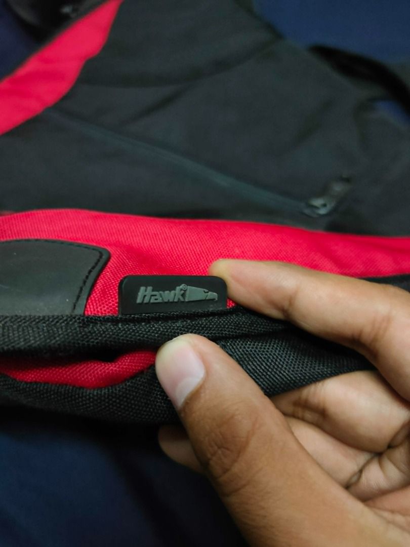 Hawk Messenger Bag (BRED) (Category: Sling Bags) located in Manila. Submitted by montillano25396 (Listing ID 1449488869, Image 3). Description: -Hawk Messenger Back Red and Black Combination - Size: Large Minimal issue: rust stain and minor fade - Still in Great Condition.