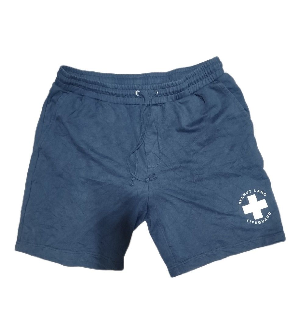 Helmut Lang Lifeguard Shorts Navy Blue (Category: Shorts) located in Davao. Submitted by vernoneighty4 (Listing ID 1449478297, Image 2). Description: - Navy blue Helmut Lang shorts - Features 'Lifeguard' graphic print on the leg - dimension W32-38 L21 - Elastic waistband with drawstring - Comfortable fit - Perfect for casual wear.