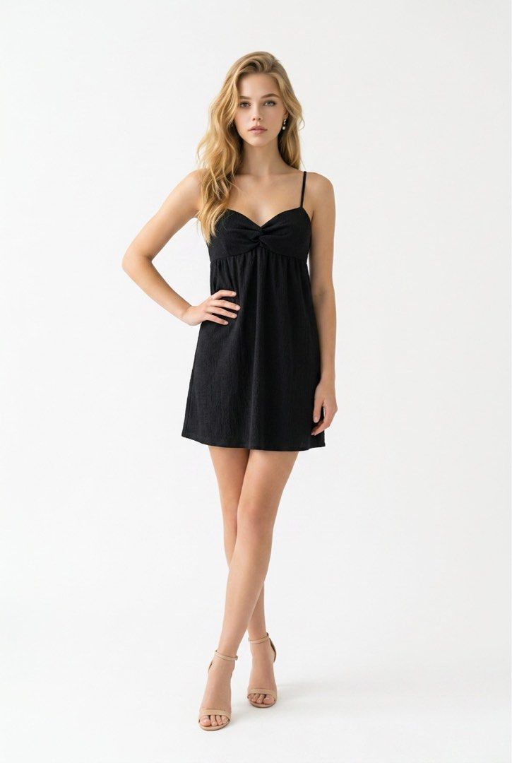 H&M Divided Black Textured Mini Dress (Category: Dresses) located in Cebu City. Submitted by hazelcris (Listing ID 1449432385, Image 1). Description: - Cute black mini dress from H&M Divided - Textured fabric for a unique feel - Flattering sweetheart neckline with a stylish twist detail - Adjustable spaghetti straps for a perfect fit - Versatile for casual outings or dressing up - Easy to style for any occasion.