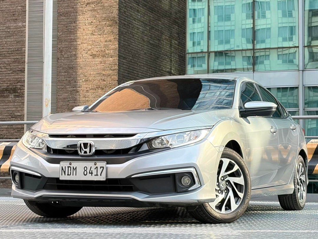 Honda Civic 1.8 (A) (Category: Used Cars) located in Makati City. Submitted by maby_latido05 (Listing ID 1449344158, Image 2). Description: 2019 Honda Civic 1.8 S Variant GAS AT‼️🔥 2 YRS - Php 38,801 3 YRS - Php 28,035 4 YRS - Php 23,247 (Chattel & Insurance included) FREE FULL VEHICLE SCANNING FREE Transfer FREE Detailing FREE Bank Processing 100% LEGIT MILEAGE 1ST OWNERSHIP Well-maintained Mileage 41k Ending 7 Key Less Entry Touchscreen 100% n