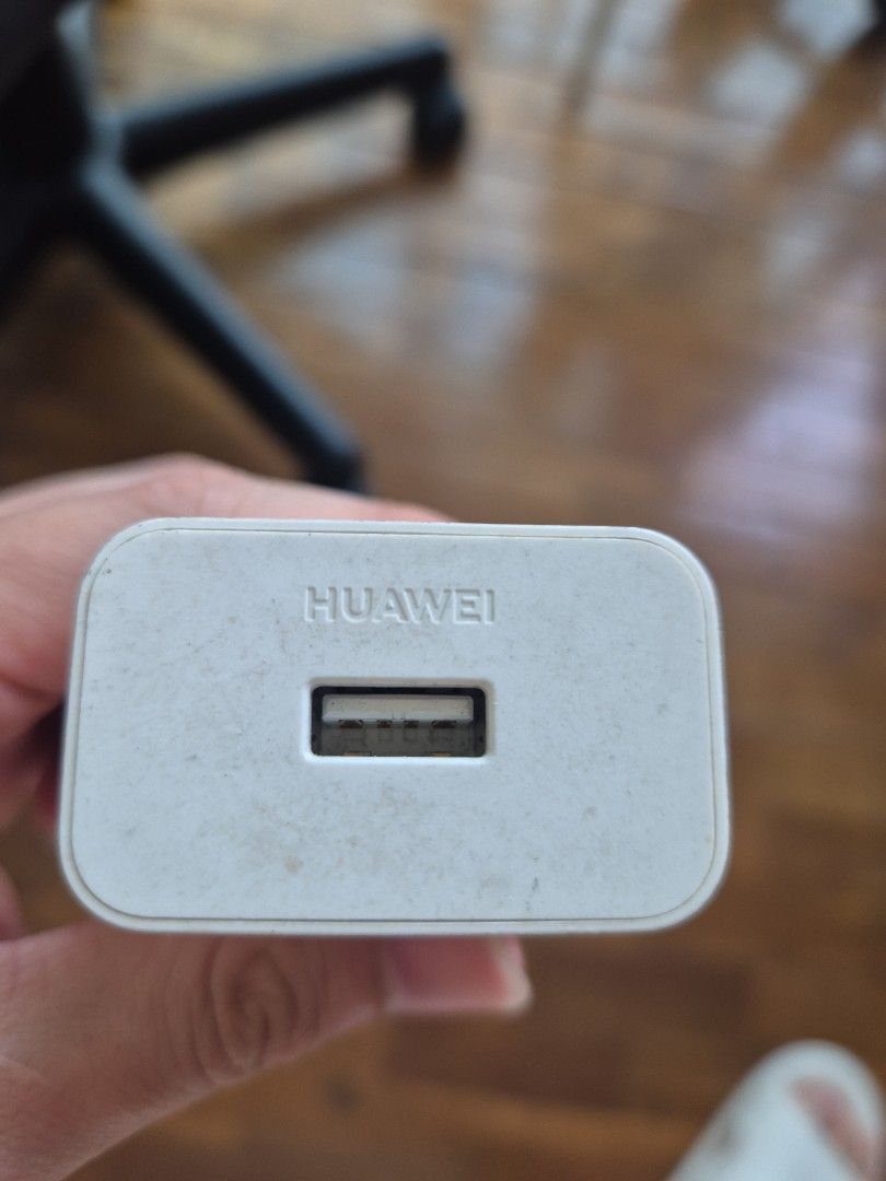 Huawei SuperCharge 40W USB Wall Charger Adapter (Category: Chargers & Cables) located in Manila. Submitted by zotag (Listing ID 1449531326, Image 2). Description: - Huawei SuperCharge Wall Adapter - 40W Fast Charging - USB Output - 100-240V Input - Works perfectly - Minor cosmetic scuffs from normal use - Selling due to phone upgrade.