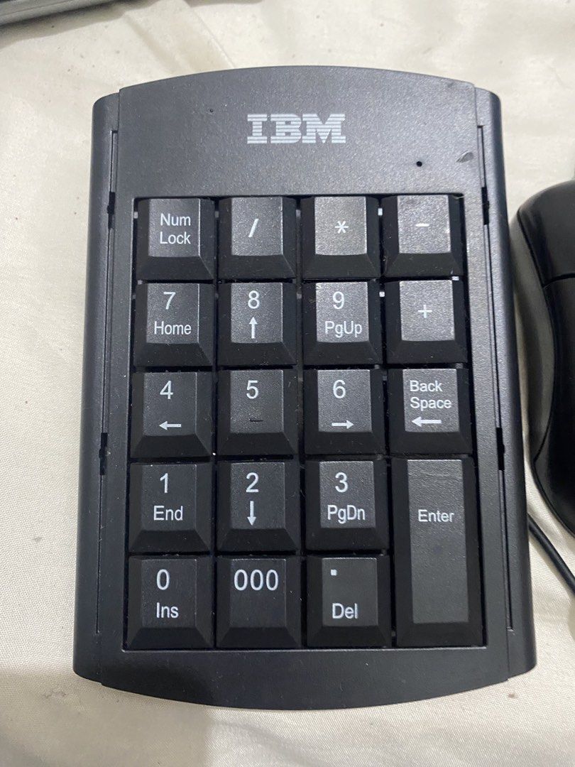 IBM Numeric Keypad and Mouse Combo (Category: Computer Keyboard) located in Manila. Submitted by newdolphin.4097cf (Listing ID 1449481960, Image 1). Description: - IBM wired numeric keypad with full number keys (Num Lock, Enter, Del) - Standard wired black mouse with 2 buttons and scroll wheel - Ideal for data entry or adding extra number keys - Both items tested and confirmed working.