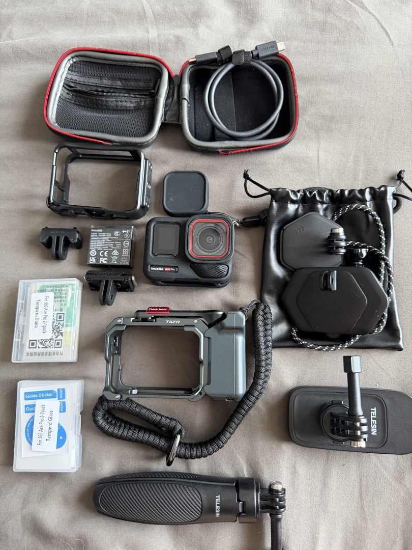 Insta360 Ace Pro 2 Xplorer Bundle Dual Battery (Category: Cameras) located in Balagtas. Submitted by jdj15 (Listing ID 1449359518, Image 1). Description: Insta360 Ace Pro 2 Xplorer Bundle Dual Battery Complete with box - 1x Insta360 Ace Pro 2 - 1x Tilta Grip (Dark Gray) - 2x Batteries - 1x standard mount - 1x wind guard pre installed - 1x mic cap - 1x USB C cable Accessories included: - 1x Insta360 bag (yellow) - 1x TELESIN hard case - 3x Tempere