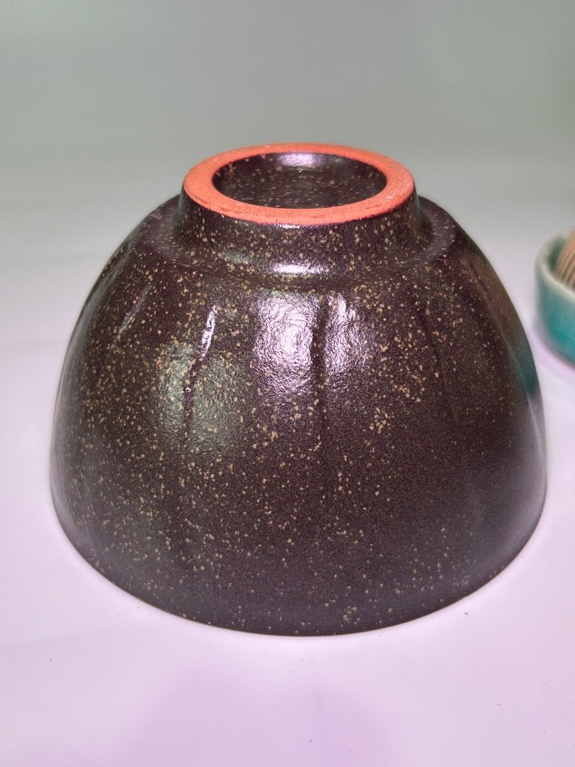 Japanese Matcha Chasen (Category: Coffee & Tea Tableware) located in Taguig. Submitted by Rare_findsmnl (Listing ID 1449401364, Image 2). Description: Code: Yamato This dark, speckle-glazed ceramic bowl resembles traditional Japanese tenmoku style tea bowls often used in tea ceremonies ₱200 Available 1pc Size: H: 3” Diameter 5” Color white strokes, gray and green Material: Stoneware Sellers favorite 🤩 🍯glazed 🍯in excellent condition 🍯thick & 