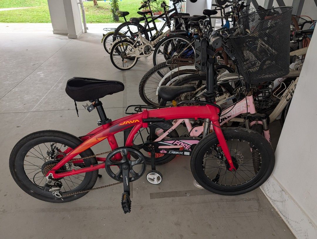 JAVA Folding Bicycle Red (Category: Bicycles) located in Singapore. Submitted by holloww (Listing ID 1449533436, Image 1). Description: - Red JAVA folding bike - 20-inch wheels - Front and rear disc brakes - Comes with a basket - Ideal for commuting and casual rides - Ready for a new owner - Condition as what you see.