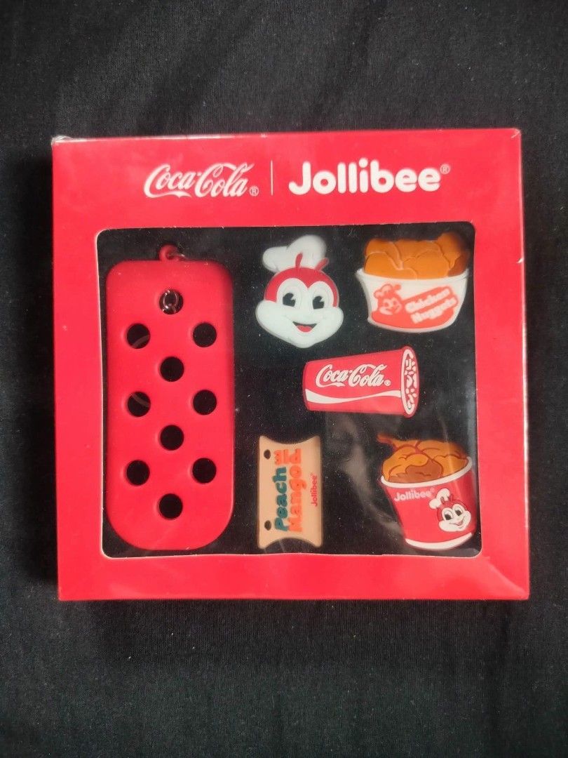 Jollibee Coca-Cola Keychain Charms Set (Category: Character Goods) located in Marilao. Submitted by shanelle_nicola (Listing ID 1449427479, Image 1). Description: - Adorable Jollibee and Coca-Cola collectible set from Singapore. - Includes Jollibee character figure. - Features miniature chicken nuggets and peach mango pie charms. - Comes with a Coca-Cola can charm. - Includes a red polka dot keychain. - Ideal for Jollibee and Coca-Cola enthusiast