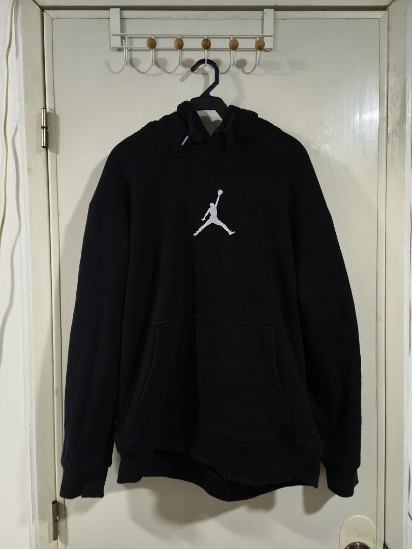 Jordan 23 Black Hoodie (Category: Hoodies) located in Iloilo. Submitted by daddy_declutter (Listing ID 1449514316, Image 1). Description: - Classic black Jordan hoodie - Iconic Jumpman logo on the front - Bold '23' graphic and 'Jordan The Brand Of Flight' text on the back - Adjustable drawstrings for the hood - Convenient front pocket - Ideal for everyday casual style 25 x 21.