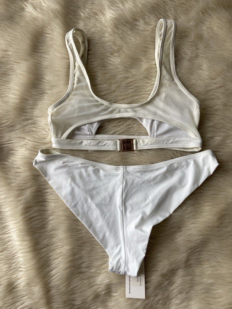 Kipper & Zink white 2-piece bikini set (Category: Activewear) located in Pasig City. Submitted by sandace (Listing ID 1449327526, Image 2). Description: Authentic BNWT Top size XS Bottom size S.