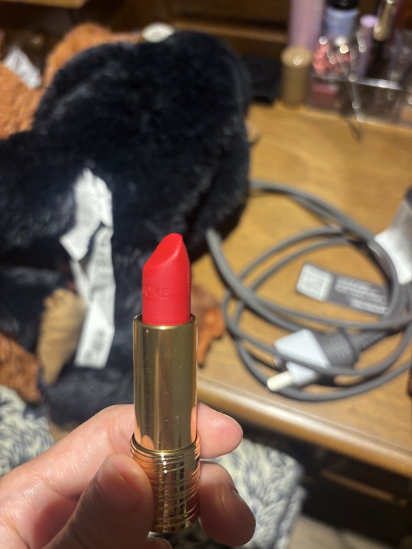 Lancôme Lipstick 525 Paradiso (Category: Makeup) located in Manila. Submitted by migflo (Listing ID 1449459269, Image 3). Description: - Brand: Lancôme - Shade: 525 Paradiso - Color: Bright, bold red - Casing: Gold - Condition: Lightly used, plenty of product remaining - Reason for Selling: Decluttering lipstick collection.