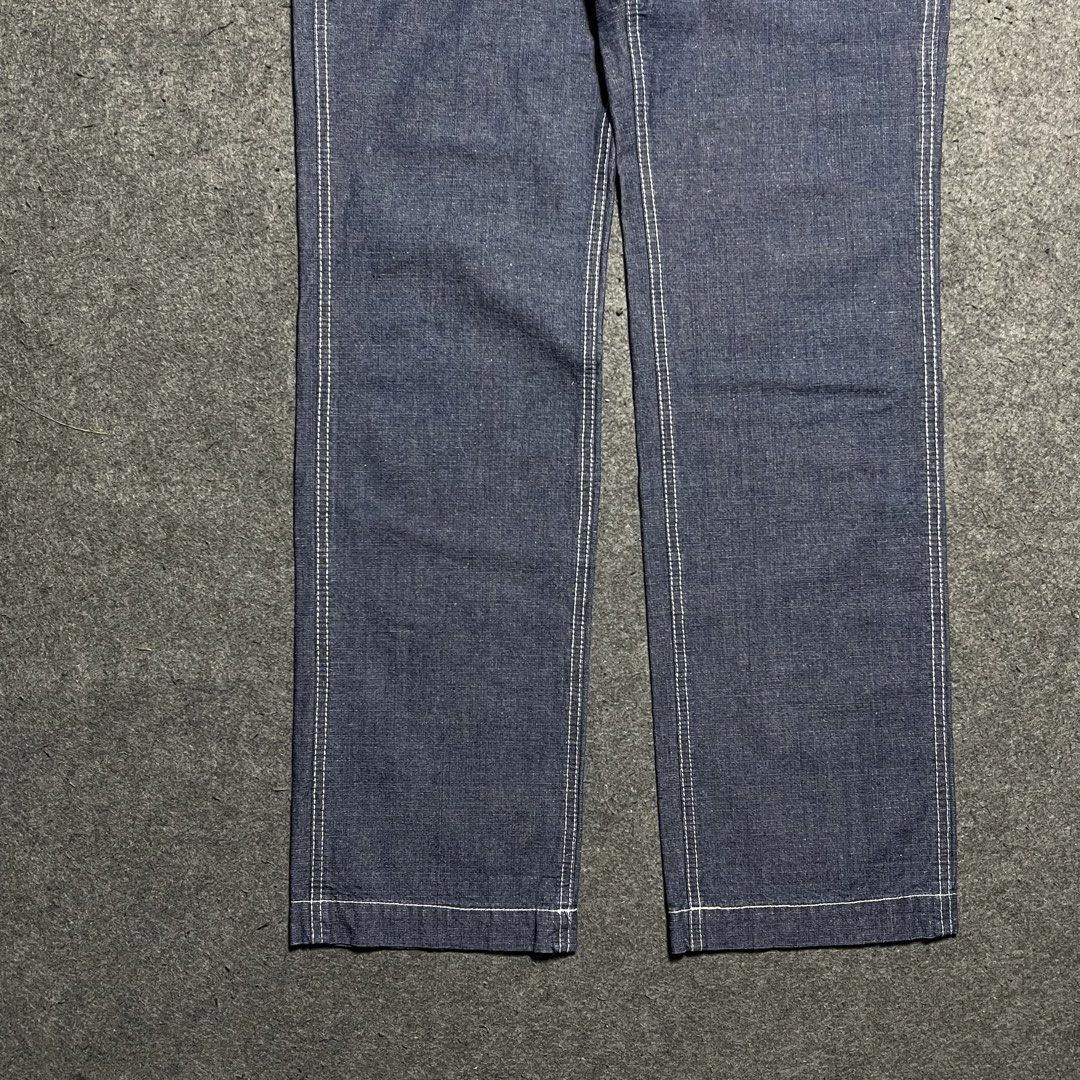 Legendar Outfit Indigo Baker Pants (Category: Trousers) located in Zamboanga. Submitted by rag_20 (Listing ID 1449516945, Image 3). Description: Legendar Outfit Indigo Baker Pants Features classic, squared-off front utility patch pockets typical of fatigue styles, along with reinforced side tool pocket insertions, Finished with bold, white triple-needle contrast topstitching across the main seams for added structural durability.Crafted from textu