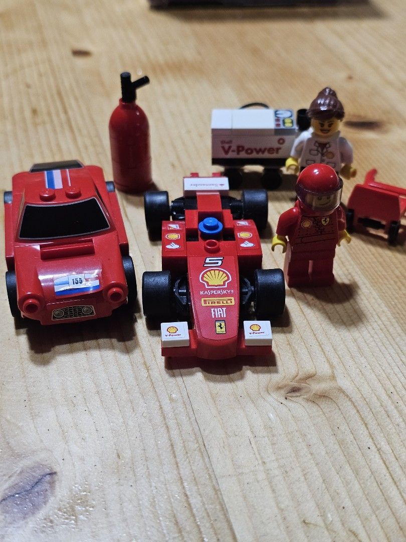 LEGO Shell Set (Category: Lego & Building Sets) located in Baguio. Submitted by thriftfinds_2600 (Listing ID 1449499928, Image 1). Description: - LEGO Speed Champions Ferrari set - Includes a Formula 1 car with Shell and Fiat decals - Features a red sports car with number 155 - Comes with two minifigures, one in a Ferrari racing suit - Accessories include a V-Power fuel barrel and a fire extinguisher - Ideal gift for Ferrari and LEGO enthusiasts.