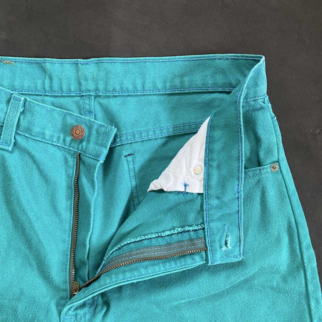 Levi's 501 Jeans - Teal (Category: Jeans) located in Tarlac. Submitted by thrifttuff_ (Listing ID 1449427081, Image 3). Description: 34W / 41L / 8.5LO Classic Levi's 501 jeans in a bright teal color. Button fly closure. Standard five-pocket styling. The iconic orange tab is on the back pocket. Made from durable denim. Great statement piece for any wardrobe, rare one of one colorway..