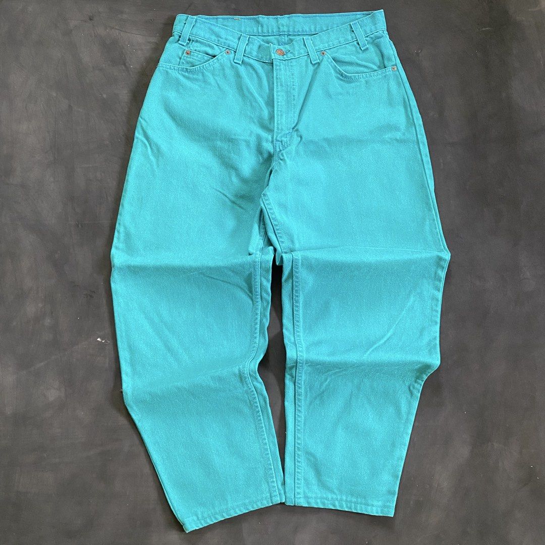 Levi's 501 Jeans - Teal (Category: Jeans) located in Tarlac. Submitted by thrifttuff_ (Listing ID 1449427081, Image 1). Description: 34W / 41L / 8.5LO Classic Levi's 501 jeans in a bright teal color. Button fly closure. Standard five-pocket styling. The iconic orange tab is on the back pocket. Made from durable denim. Great statement piece for any wardrobe, rare one of one colorway..