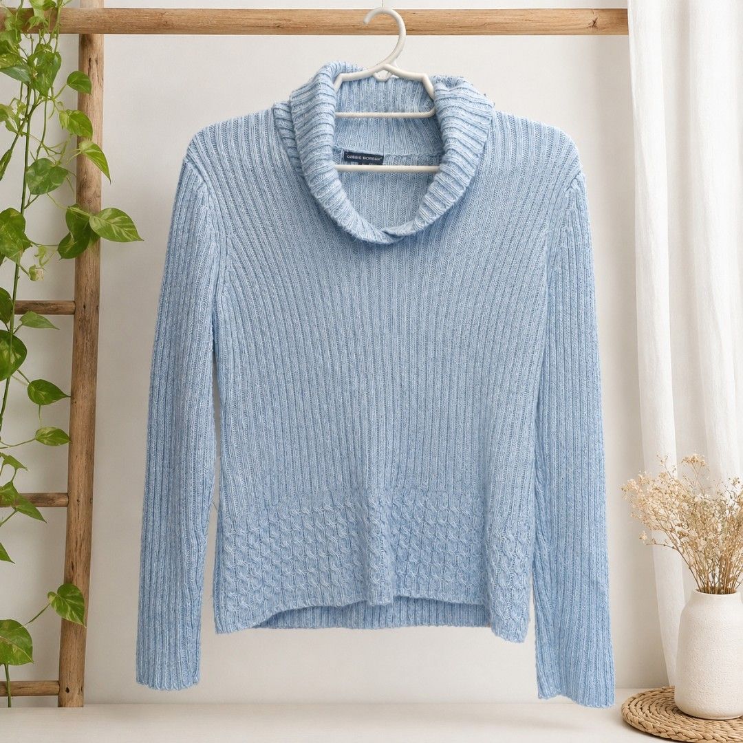 Debbie Morgan Light Blue Ribbed Turtleneck Sweater (Category: Longsleeves) located in Mandaluyong City. Submitted by daisydlopez (Listing ID 1449533136, Image 1). Description: - Cozy light blue sweater - Ribbed knit with textured hem detail - Long sleeves, perfect for layering - Soft and comfortable material.
