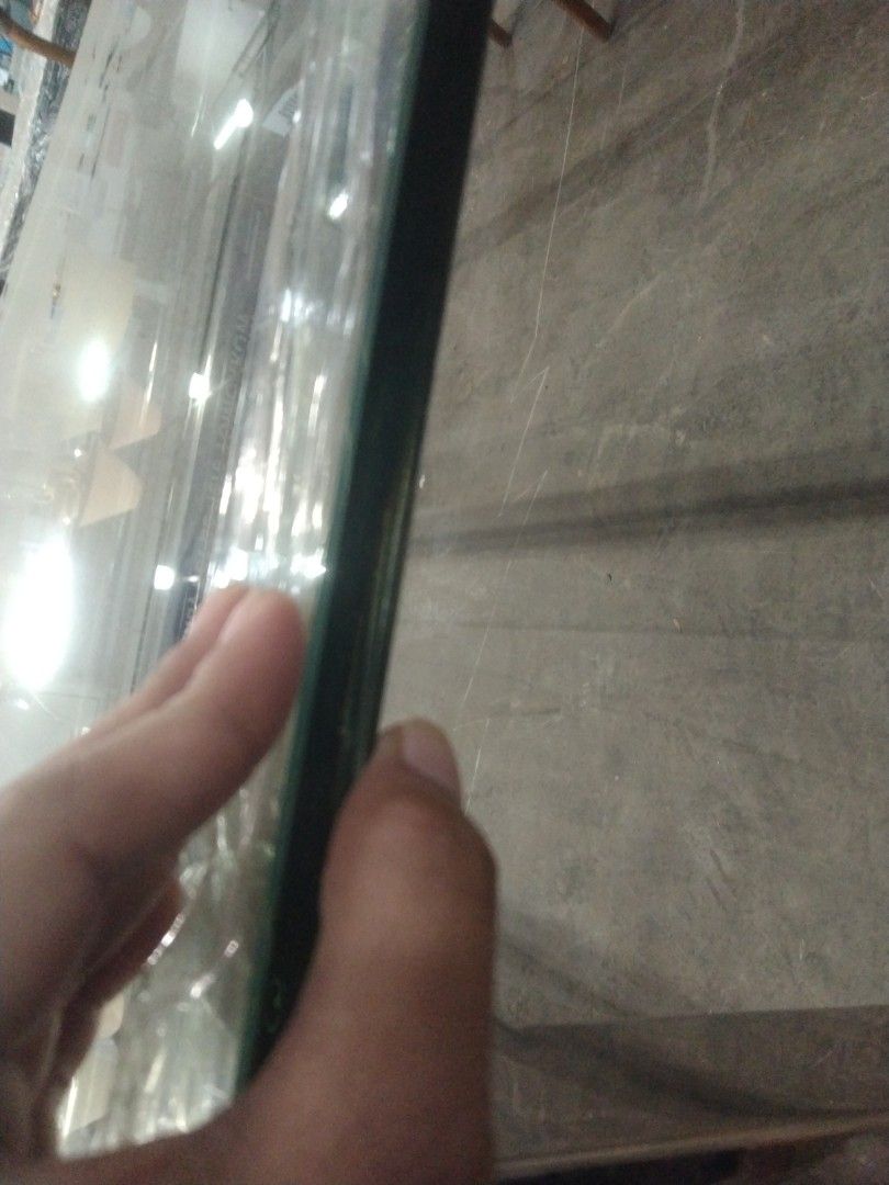 Long glas table (Category: Tables & Sets) located in Manila. Submitted by maria123_a (Listing ID 1449360818, Image 2). Description: Long glass top table 30x75.5x31.5in.