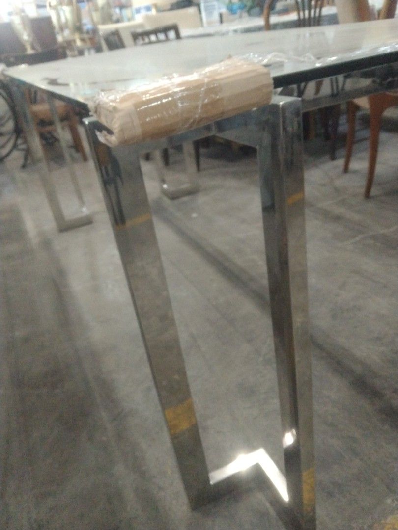 Long glas table (Category: Tables & Sets) located in Manila. Submitted by maria123_a (Listing ID 1449360818, Image 3). Description: Long glass top table 30x75.5x31.5in.
