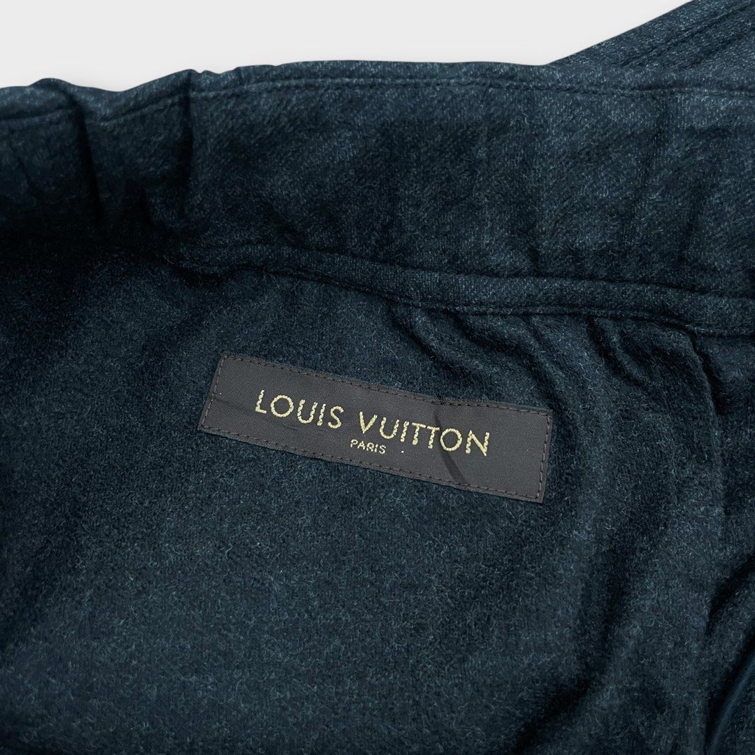 Louis Vuitton - Vintage - Belted Wool Trousers (Category: Trousers) located in Los Banos. Submitted by declutterking (Listing ID 1449330634, Image 3). Description: Size 42 on tag • 93% Wool | 7% Polyamide • Built-in belt • Minimal burn hole on side hem (not noticeable) Dimensions: 17" waist 10.75" front rise 43.25" length 7.25" leg opening Excellent condition Authentic .