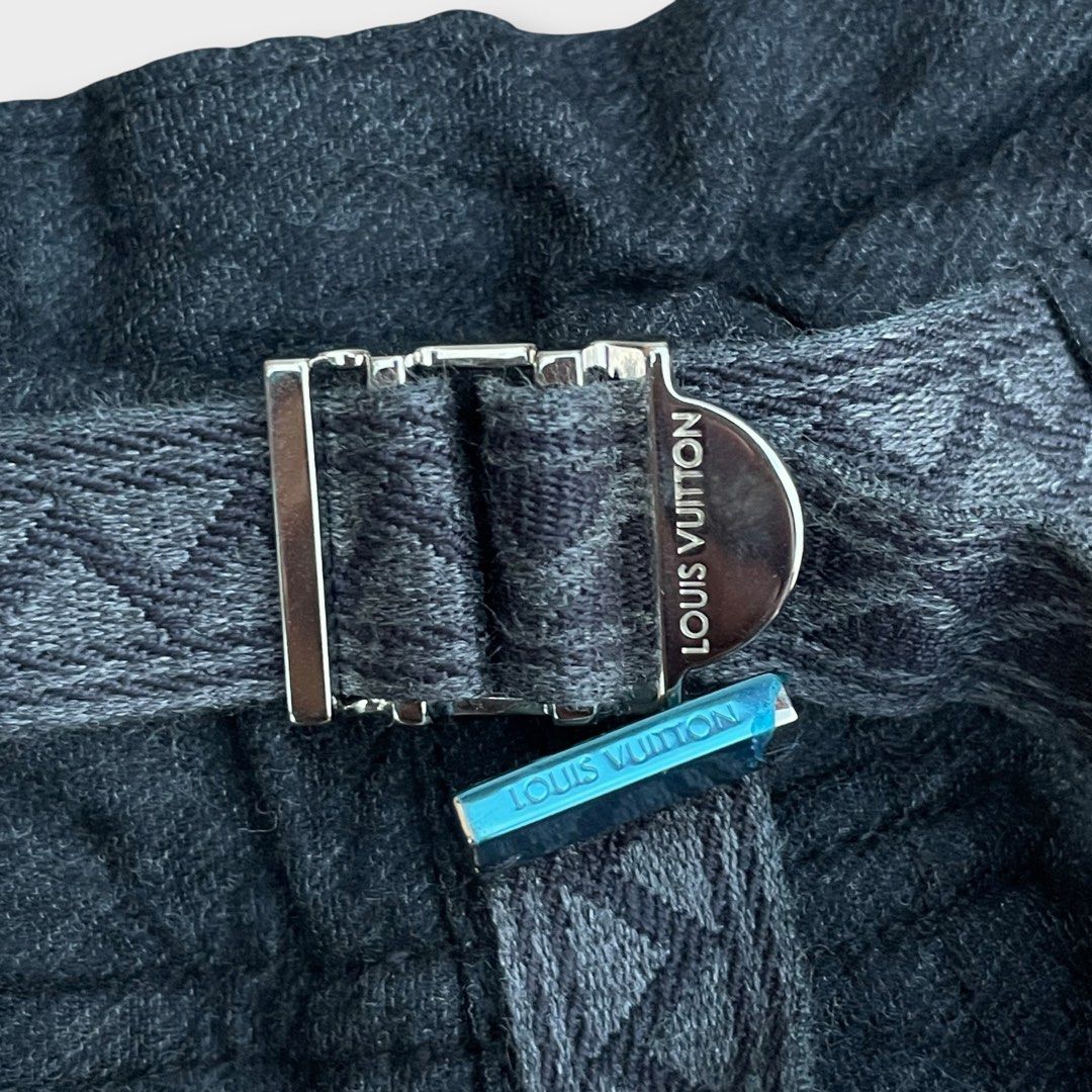 Louis Vuitton - Vintage - Belted Wool Trousers (Category: Trousers) located in Los Banos. Submitted by declutterking (Listing ID 1449330634, Image 2). Description: Size 42 on tag • 93% Wool | 7% Polyamide • Built-in belt • Minimal burn hole on side hem (not noticeable) Dimensions: 17" waist 10.75" front rise 43.25" length 7.25" leg opening Excellent condition Authentic .