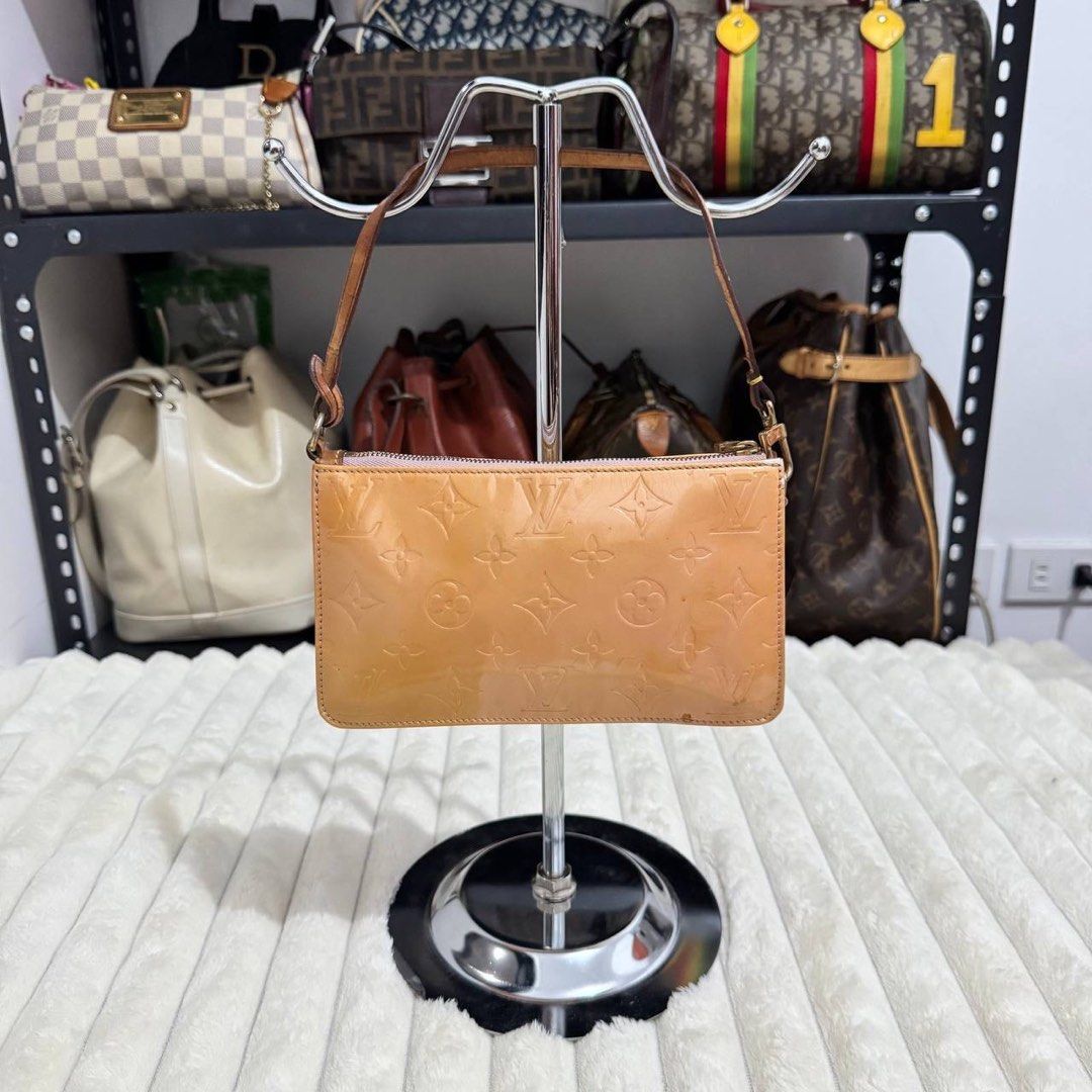 Louis Vuitton Vernis Lexington Pochette (Category: Luxury Bags & Wallets) located in Manila. Submitted by retro.archives (Listing ID 1449491111, Image 2). Description: Louis Vuitton Vernis Lexington Pochette Condition & Flaws: (See Detailed Pictures Attached) Made in France 📐 Measurements in CM Height: 11 cm Width: 20 cm Depth: 2.5 cm Drop: 15 cm 📎 TAKE NOTE : • Please note that this is a used / thrifted piece, and minor imperfections are part 