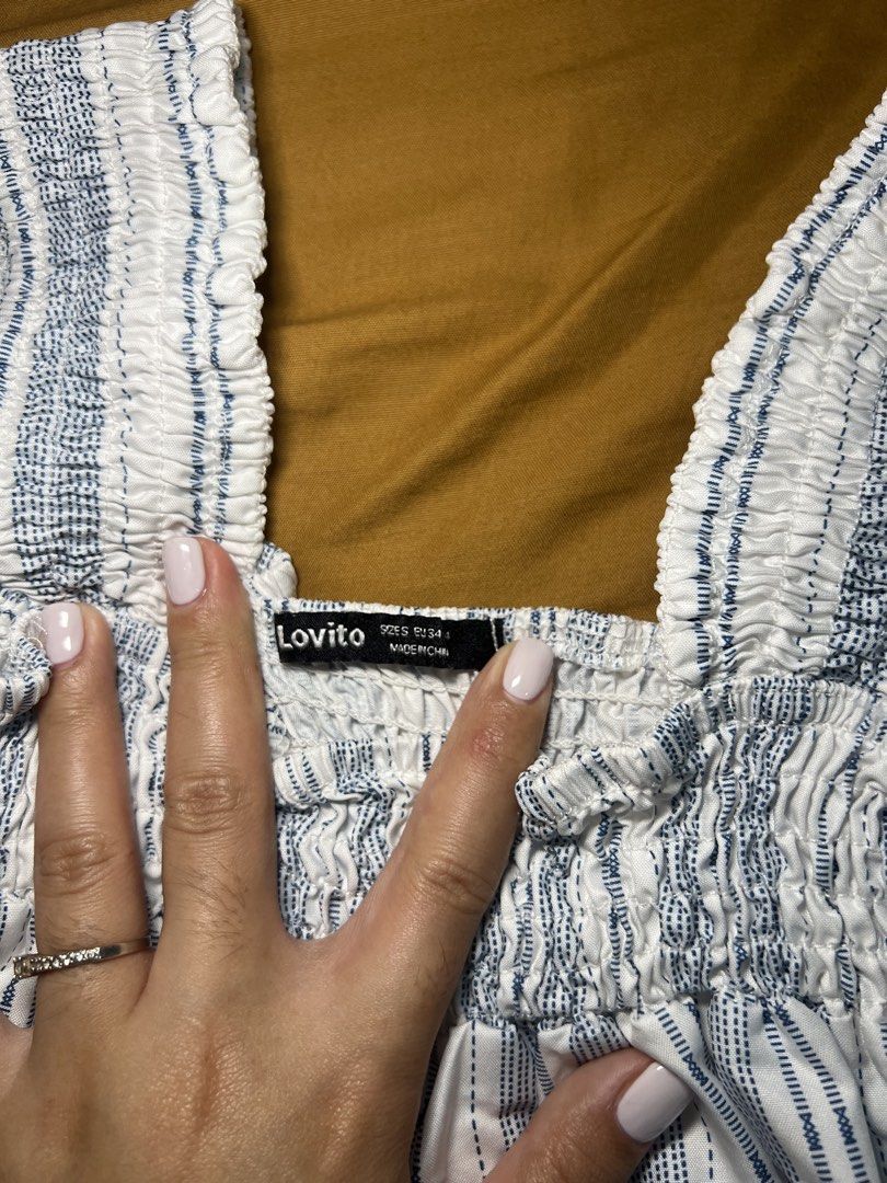 Lovito White Blue Striped Smocked Cami Top (Category: Sleeveless) located in Manila. Submitted by mzvmns (Listing ID 1449482692, Image 2). Description: BUNDLE!!! - Size Small to Medium - Once used -You can buy per piece - ₱100 per piece .